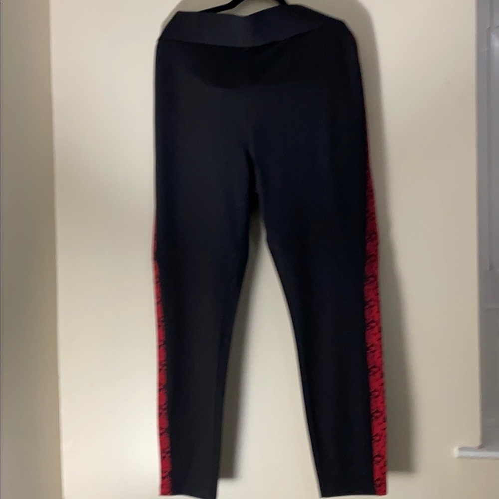 Plus size black pants with red snake print